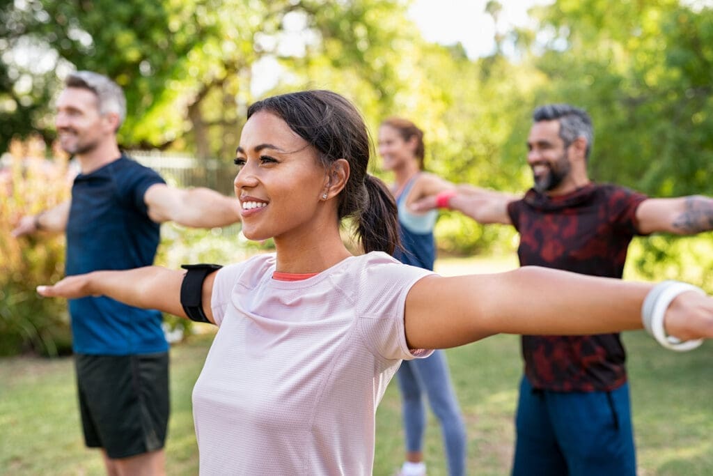 woman exercising in a group